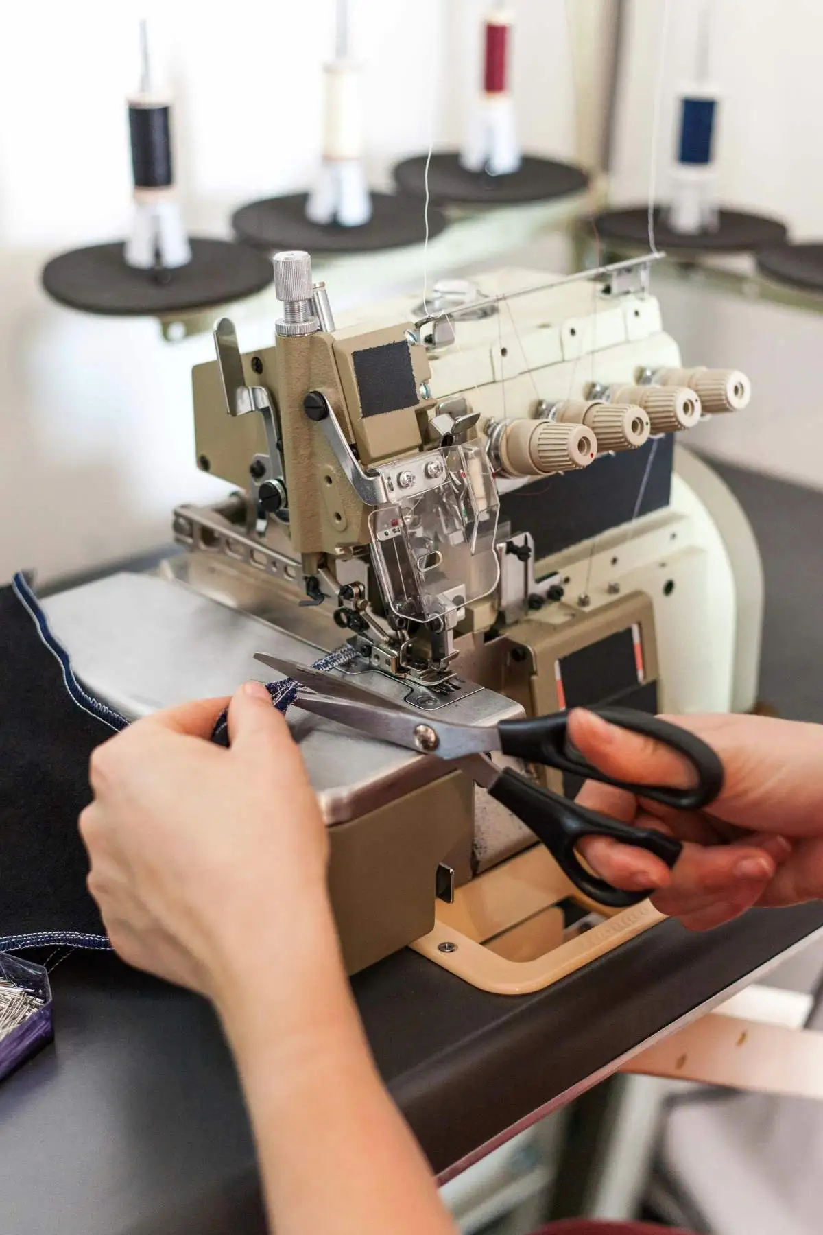 Industrial sewing machine in use at The Sewing Crest workshop